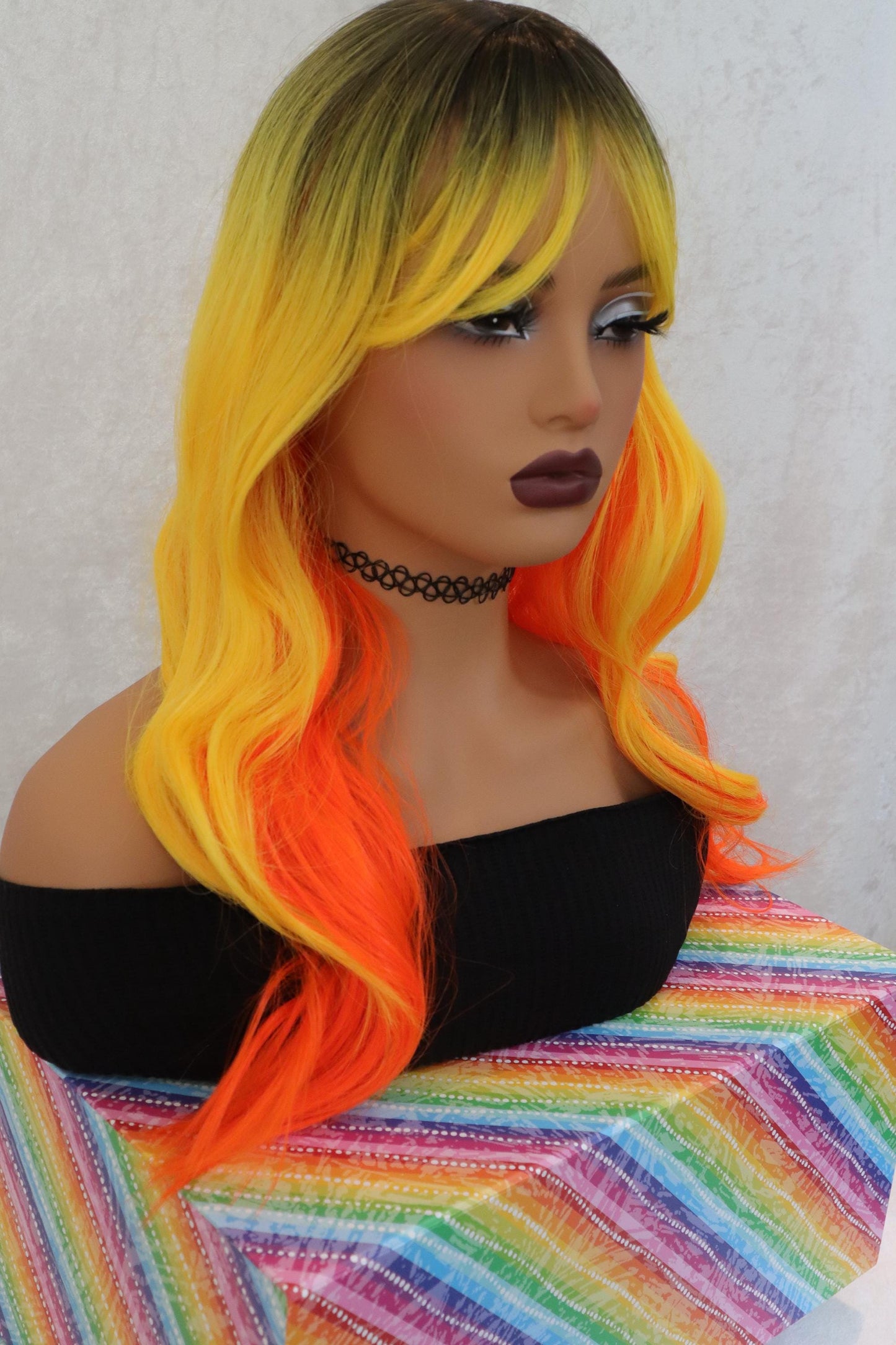 Candy Corn Wavy Wig with Orange, Yellow & Dark Roots + Bangs