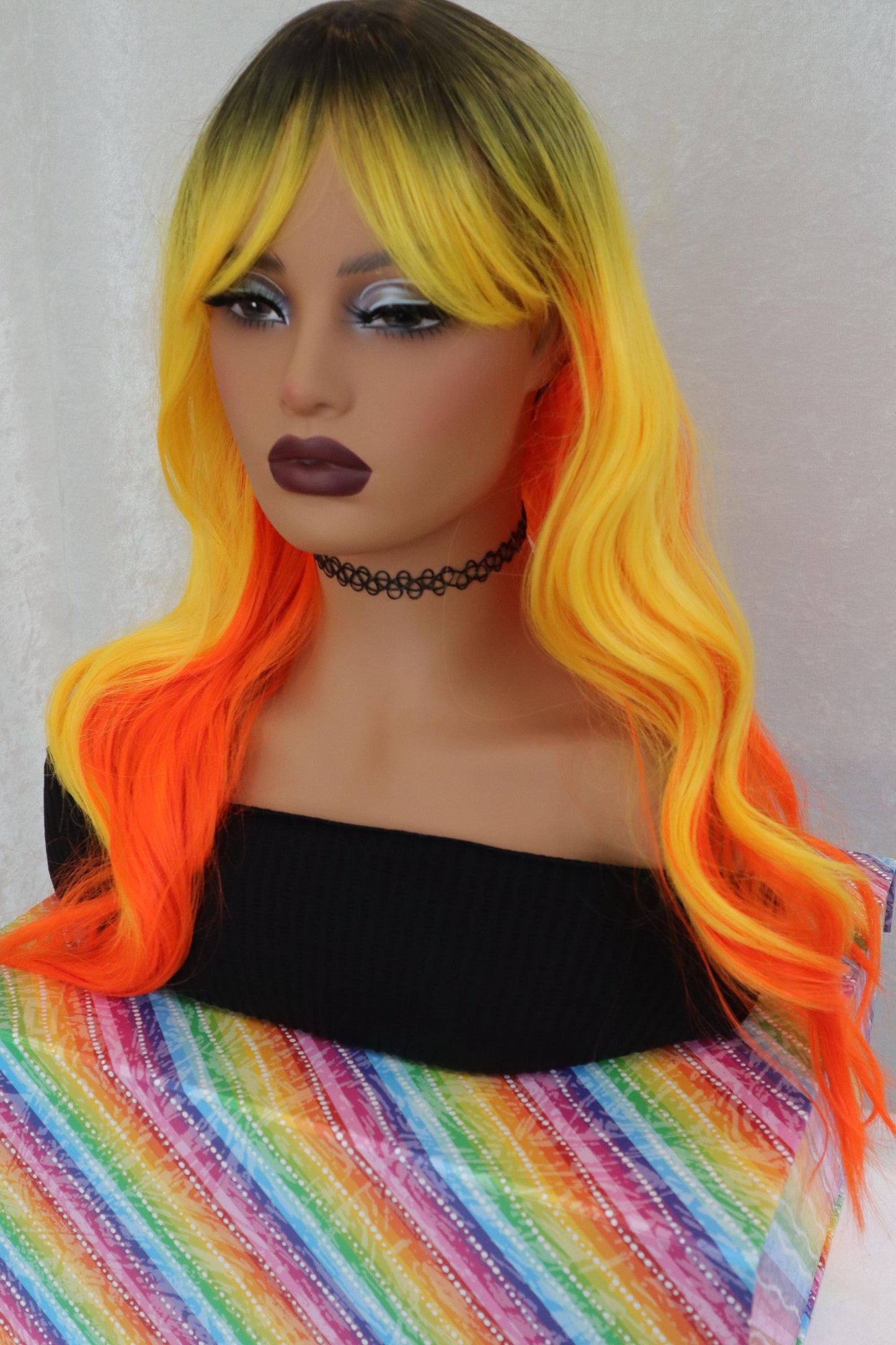 Candy Corn Wavy Wig with Orange, Yellow & Dark Roots + Bangs