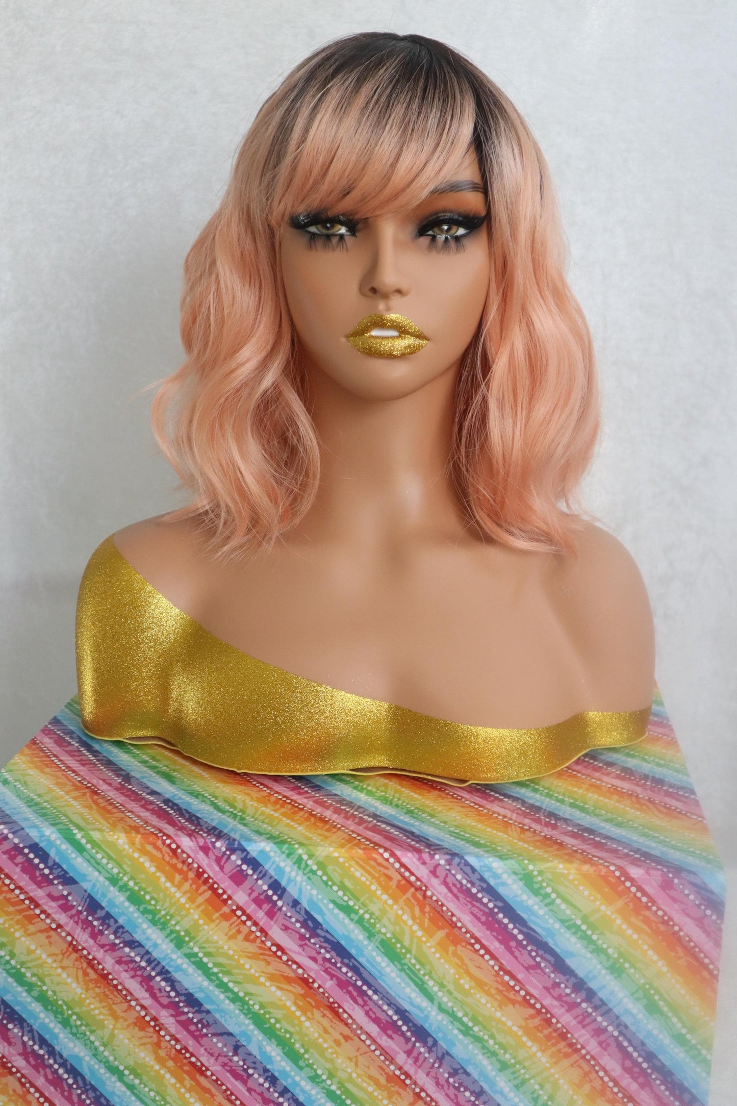 Peach Bliss 12" Wavy Wig with Dark Roots and Bangs - Fun & Vibrant for Cosplay and Everyday Glam