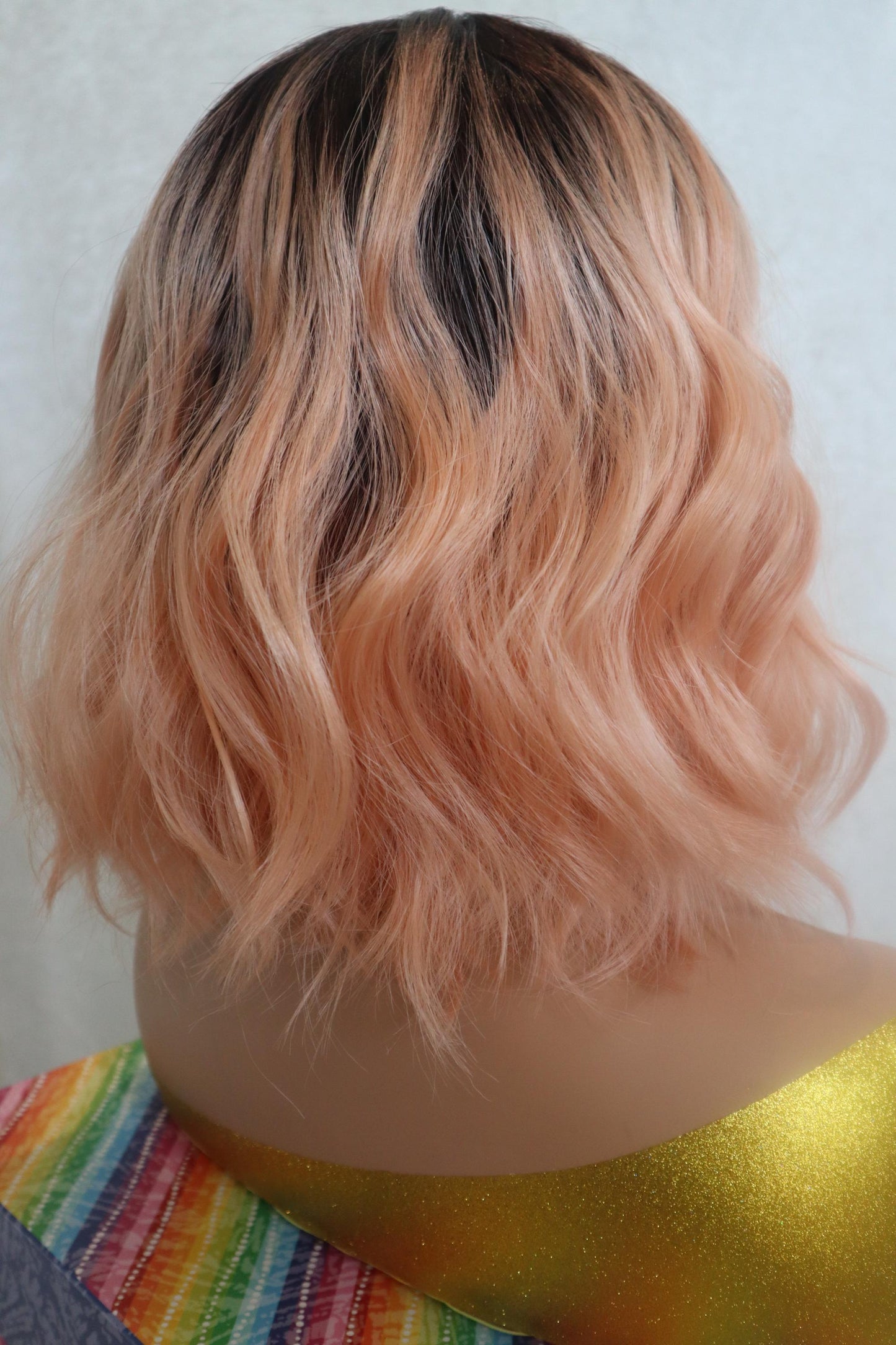 Peach Bliss 12" Wavy Wig with Dark Roots and Bangs - Fun & Vibrant for Cosplay and Everyday Glam